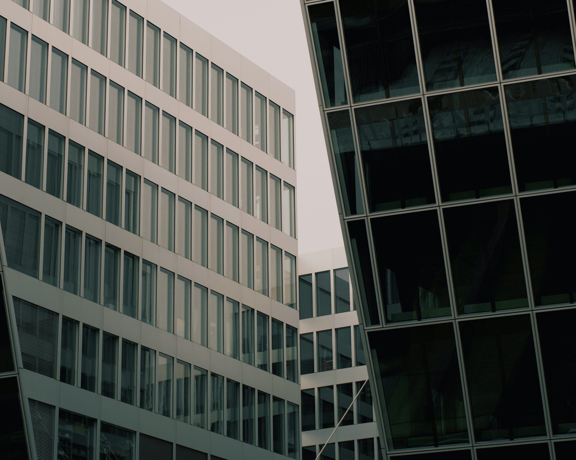 A moody view of sky-high office buildings