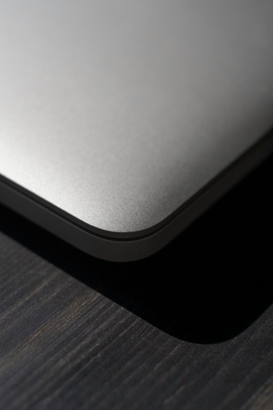 Corner of silver laptop on a table