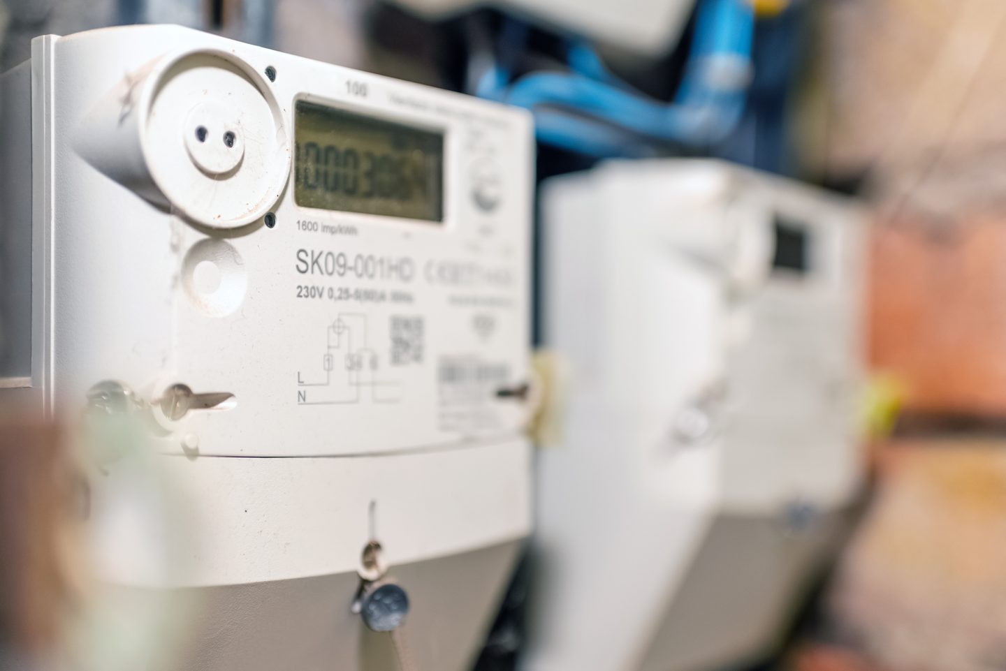 A Close-up of a modern smart grid residential digital power supply meter.