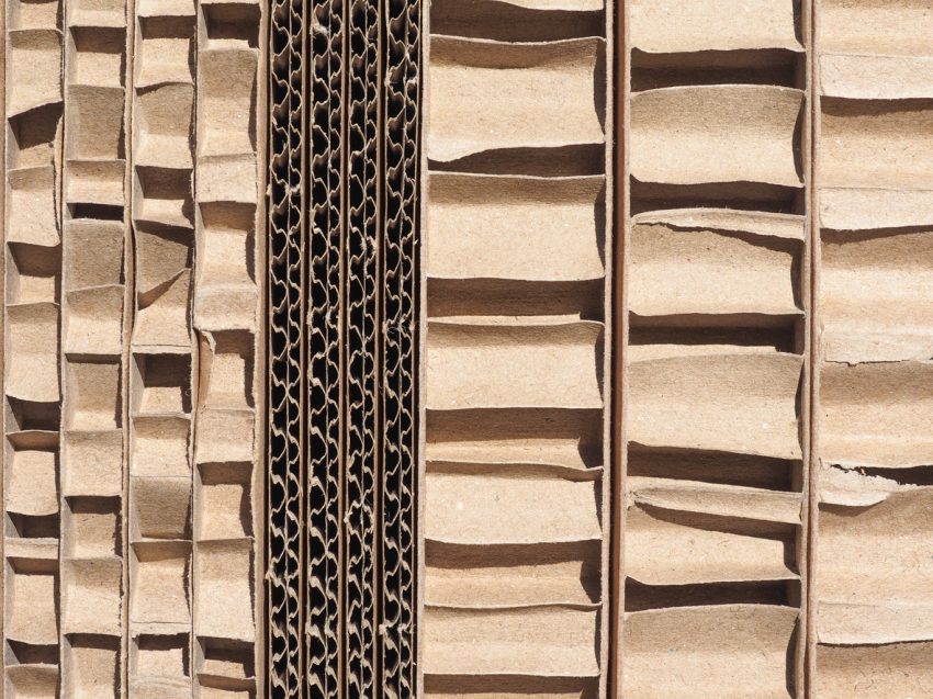 Brown cardboard texture in sunlight